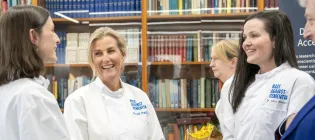 HRH The Duchess of Edinburgh pictured with the Principal, Claire Durrant and other scientists from the Dementia laboratory