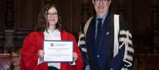 Jess Lonsdale (left) standing with Professor Colm Harmon, Vice-Principal Students