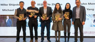 A photo of the 10 year winners at the new year event