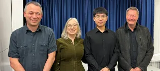 a photo of the Dr Chenyu Wang and his viva panel