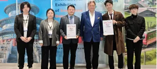 A photo of Prof Zhou Min’s team receiving their certificates at the 51st International Exhibition of Inventions in Geneva 