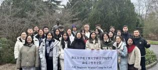 A photo of the ZJE UG students next to a statue of Dr Wong Fun