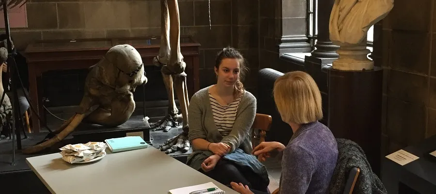 A student at the BMTO talks to a careers advisor