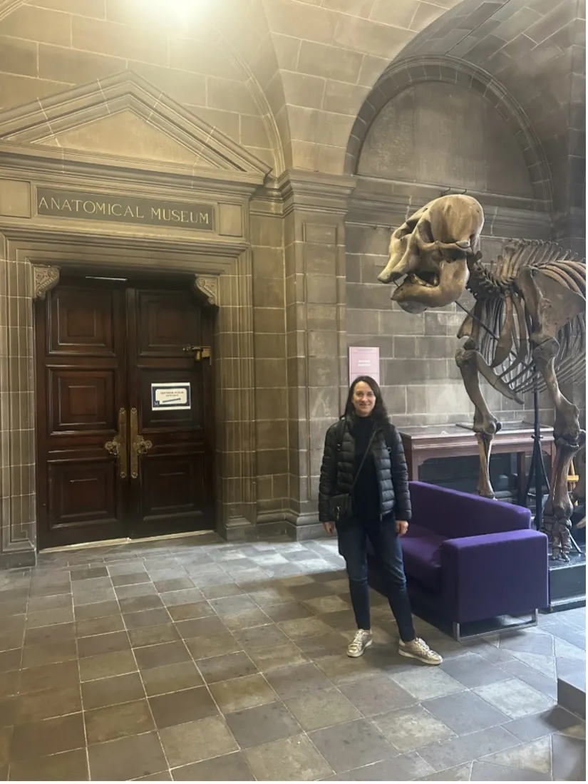 Katerina Janku Standing by Elephant Skeletons