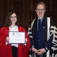 Jess Lonsdale (left) standing with Professor Colm Harmon, Vice-Principal Students
