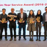 A photo of the 10 year winners at the new year event