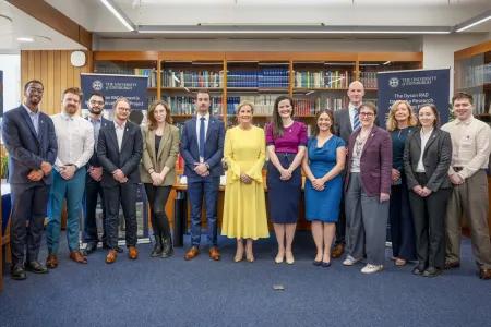 The Duchess of Edinburgh (middle, wearing yellow) with Dementia team researchers.