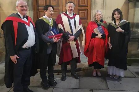 A group photo of masters graduates Gege Wang and Haolie Fang with Profs Shipston, Welburn and Le Tissier standing outside McEwan Hall after graduation