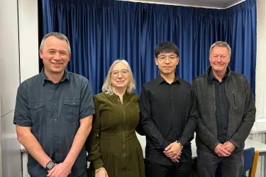 a photo of the Dr Chenyu Wang and his viva panel