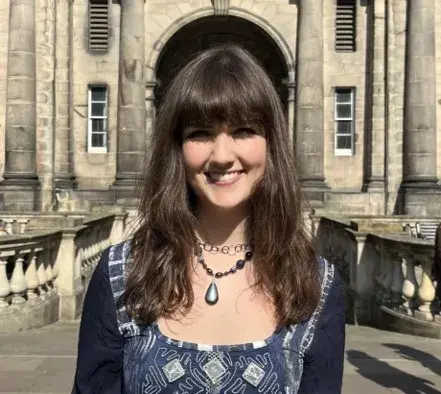 Portrait of Lex Shackley, a student from the Our Minds Scholarship, University of Edinburgh 2025 cohort.