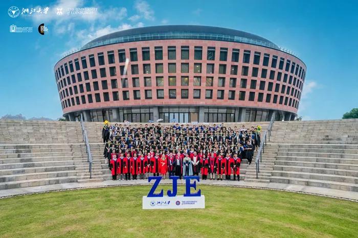 The annual group photo of ZJE staff and students on the steps of the Auditorium where they will celebrate their 2026 graduation.