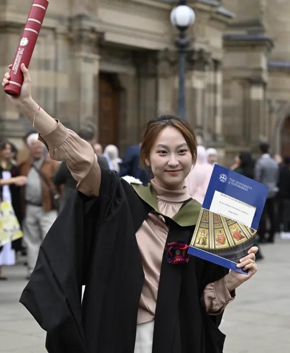 ZJE undergraduate student Yumo Chen celebrating her success at 2026 graduation