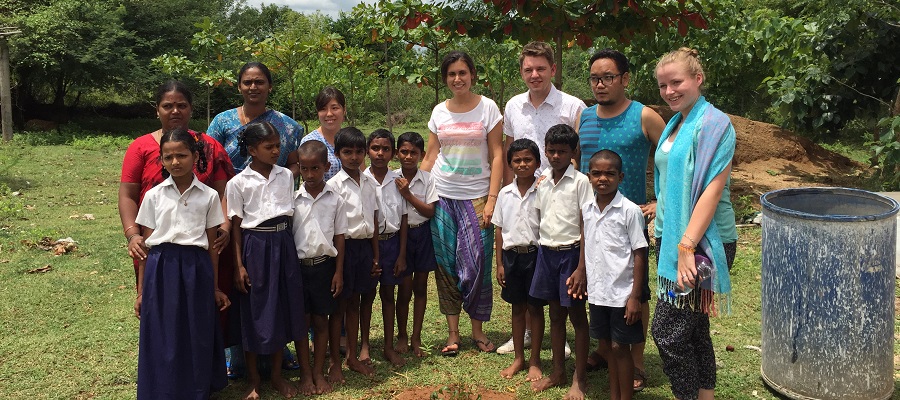 School children in Tamil Nadu planting a tree