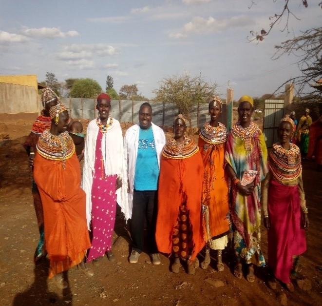 Daniel Mwangi Njuguna with Kenyan women