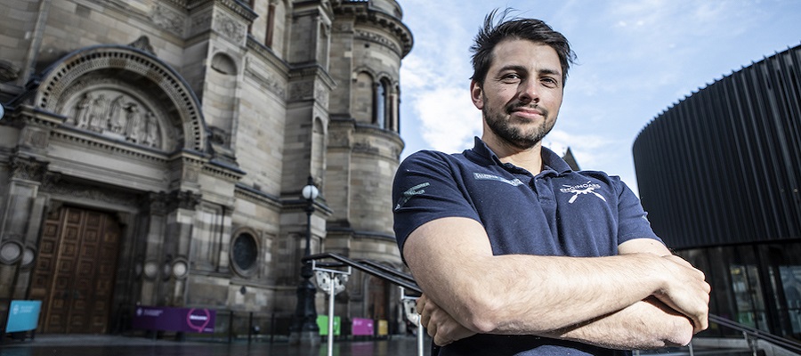 Rufus standing outside the McEwan Hall